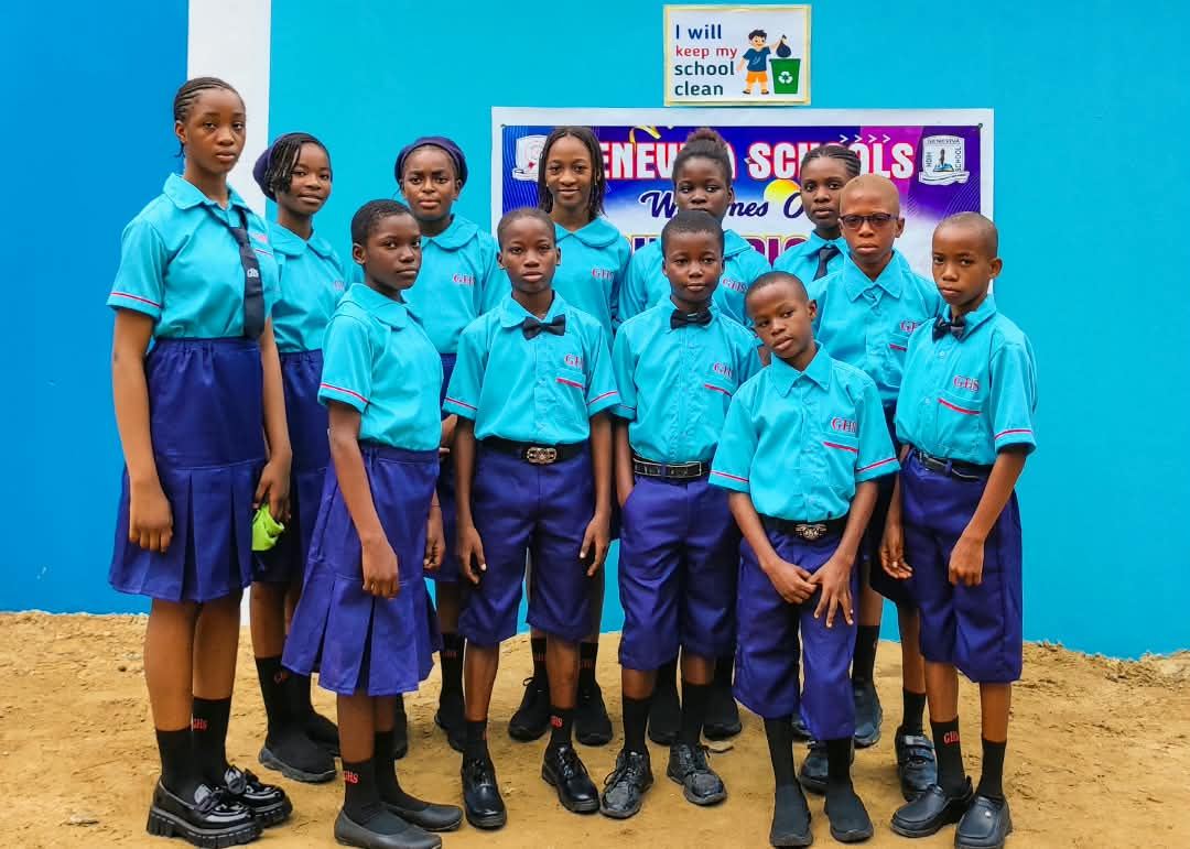 Geneviva High School students in front of the school building