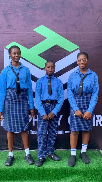 Three high school students in uniform